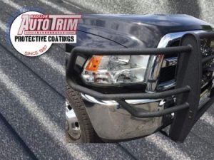 Front bumper and grill guard with M.A.T spray on coating